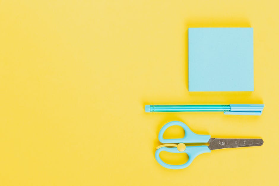 Flat lay of modern school supplies with vibrant color scheme, ideal for educational and creative themes.