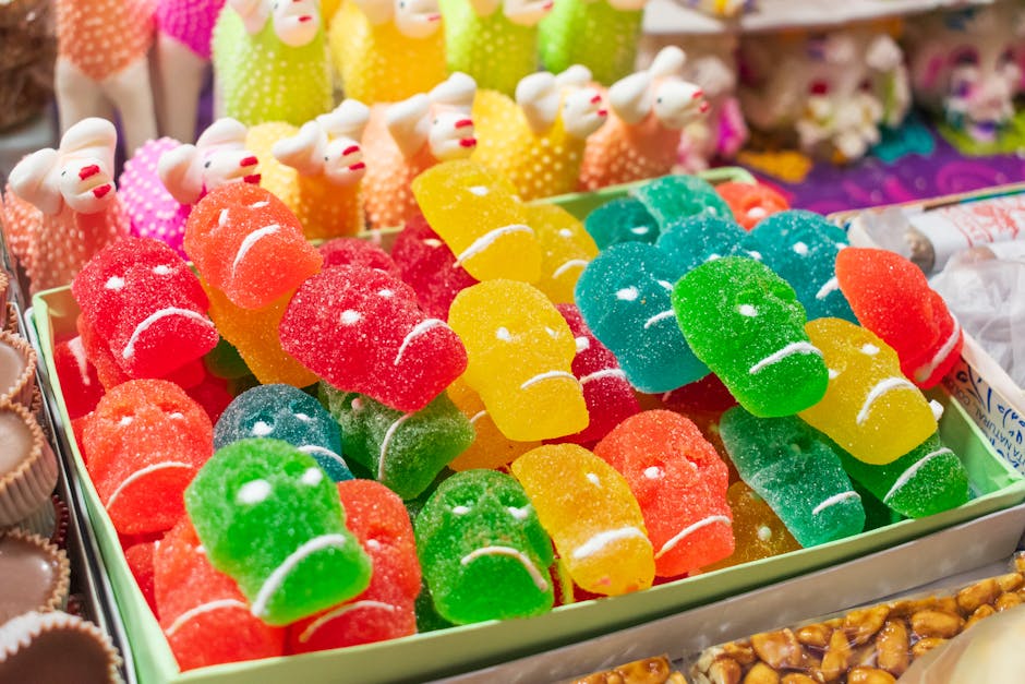 Vibrant sugar skull candies on display in Toluca, Mexico, showcasing festive Day of the Dead sweets.